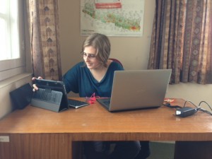 Picture of Me  using a laptop and Tablet