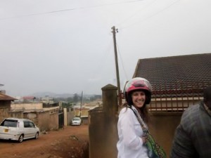 Me, Emily, on a motorcycle taxi (boda-boda) in June 2013