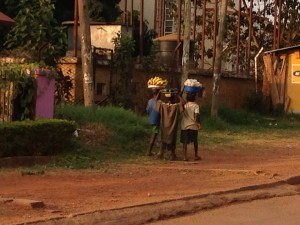 Africans transporting daily goods in Kampala