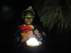 Regina, a customer, demonstrates the SunKing Pro she purchased from Moshi