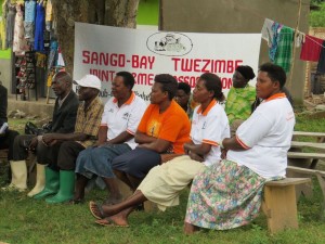 The Sango Bay Farmers/Entrepreneurs gather to answer questions during a GSBF Impact Assessment focus group for Solar Sister.