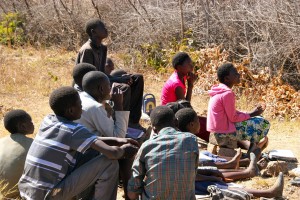 Grade six students listening to stories about Zambia