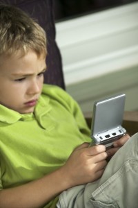 Boy Playing a Video Game