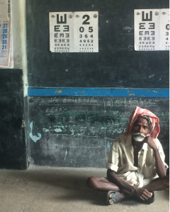 A patient waiting to be screened in the village of Mangalore 