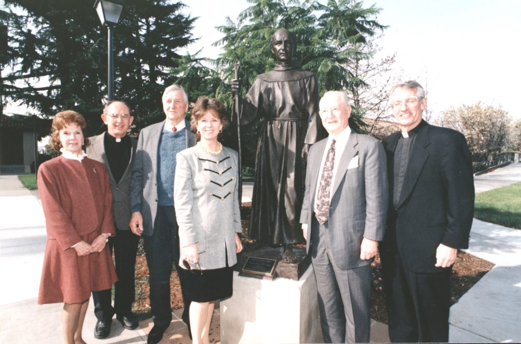 Image of group around the Serra statue on SCU's campus
