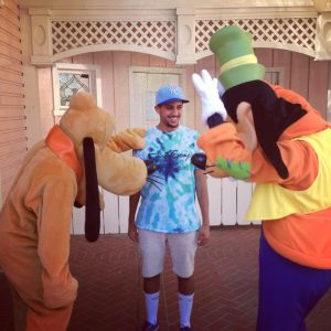 Sharing a laugh with Goofy and Pluto