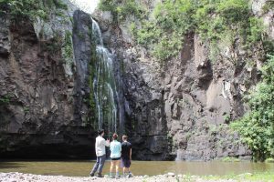 Elia, Aidan, and I enjoying the beauty of a waterfall. 