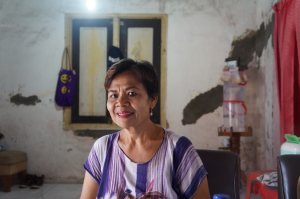 One of Nazava's filter users sits happily in her living room with her filter displayed as one of her main pieces of furniture and decoration.