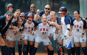 Aug. 20, 2008; Beijing, CHINA; USA players surround homeplate as they wait to celebrate with Crystl Bustos (not pictured) after she hit a three run home run in extra innings against Japan during the softball semi finals at the Fengtai Softball Field during the 2008 Beijing Olympic Games. Mandatory Credit: Mark J. Rebilas-US PRESSWIRE