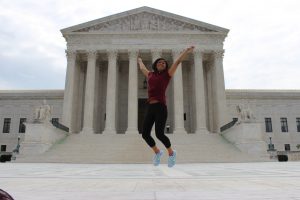 In front of the Supreme Court in Washington D.C., jumping in support of justice.