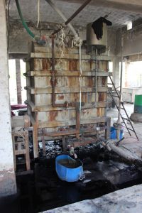 This fabric-dyeing machine in Lunkaransar is steam operated. The fabric will remain in the casing overnight. The rich indigo dye was speckled all over the dyeing plant that we visited.
