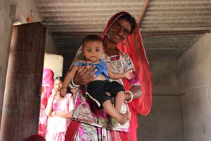 Despite the challenges that families faced, simple things still brought them joy and constantly lifted their moods. This proud grandmother was thrilled to share her grandson with us. 